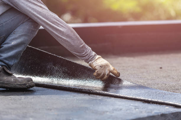Professional Waterproofing technician working in Orestes, IN